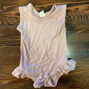 Kate Quinn ruffle leg onsie